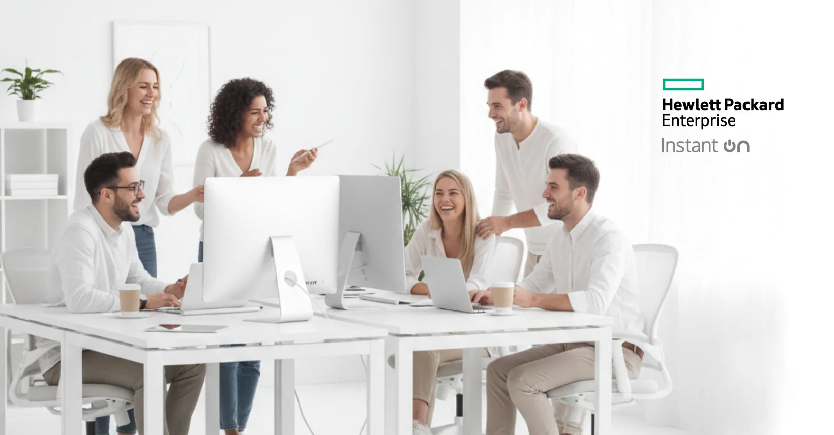 group happy in office with computer